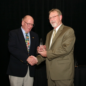 (Left to right) Marc Essig, King TUT Award recipient for the Northwest region, and Bob Mickey, Northwest regional manager. Toby Chess, award recipient for the Southwest region, was unable to attend the event. 