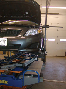 Using the extensions provided with the Vision system, one can easily measure any upper body point, such as the left end of the tie bar on this Toyota. 