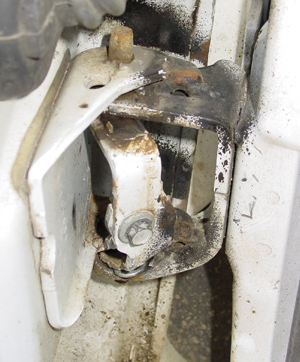 this is a hinge that was replaced at a car dealership six months prior with gm pins. a stainless steel die-chromate coated bracket helps prevent rusting like this.