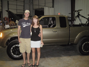 Jason Clary and his wife, Holly, with his newly tricked out truck.
