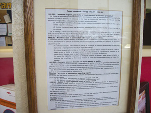 the texas insurance code, mounted on the wall for all to read.