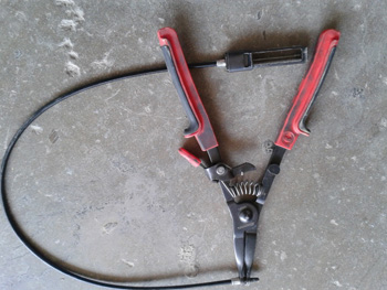 this is the specialized plier tool for removing the spring clamps on modern radiators.