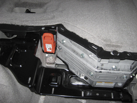 you can minimize the potential for 300-volt current flow by removing the manual disconnect lever from the hybrid battery. but keep in mind that the energy potential within the  battery cannot be disabled. even with the disconnect removed, assume the high-voltage cables and components contain high voltage.