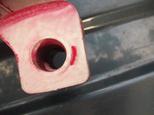2. the steering arm attachment point shows a hidden crack on the surface. note that circular rings which may indicate an insert in the casting have also shown up.