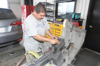 Gullo Ford's speed lane has turned the speed lane techs into bumper specialists.