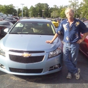 GetGreen Sweepstakes winner Don K. with his new Chevy Cruze.