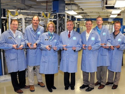 PPG management and employees participate in the ribbon-cutting ceremony for the new automated color matching laboratory in Cleveland, Ohio.