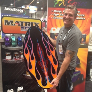 John Steidle takes home a custom skim board painted by Jeff Styles.