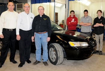 (from left to right) Carubba Collision Corp. President Joe Carubba, Carubba Collision Corporate Trainer/Safety Officer Randy Pinkowski, Erie 1 BOCES Automotive Teacher Bill Peffer along with Joe Dedominicis from Kenmore West High School, Anthony Yanes from GrandIsland High School. and Dylan Graff from Grand Island High School, who are  students in the Automotive Collision Program at the Erie 1 BOCES Kenton Career & Technical Center in Buffalo, N.Y.