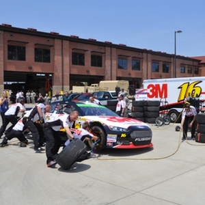 A pit crew demonstration was provided by members of NASCAR driver Greg Biffle's team.