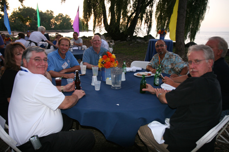 attendees soak up the luau atmosphere at thursday night's welcome dinner.