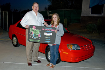 Lindsay Johnson, recent 2010 Ironwood High graduate, receives keys to newly refurbished car from Mike Quinn of 911 Collision Centers, which has sponsored Project Graduation since its inception in 2004.