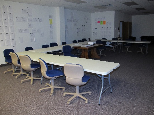 a training room ensures that employees company-wide can get updated on systems and processes.