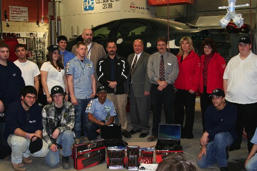 In photo with Bay Path students, from left to right, are: Jeremy Guay, Assistant Vocational Director at Bay Path; Paul Folino of LKQ / Keystone Automotive Industries; Dave Papagni, Bay Path Superintendent Director; Ray Beck, Auto Collision Repair Teacher; and Christine Packard and Cathy Peterson, Commerce Insurance