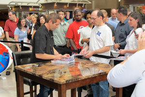 biffle signs autographs for fans at the avenue at tower city in cleveland, ohio.
