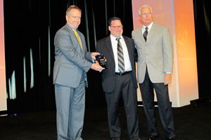 (Left to right) BSB Publisher Scott Shriber, 2011 Collision Repair Shop Executive of the Year Mike LeVasseur, and ASA President Ron Pyle.