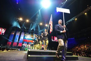 mark claypool leads the u.s. team across the stage in the olympic-style parade of nations at the worldskills championships. 
