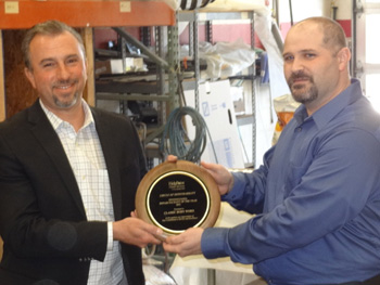 Classic Body Worx Owner Joe Pellegrini (left) accepts Farmers' Facility of the Year award from Farmers COD Coordinator David Iannelli.