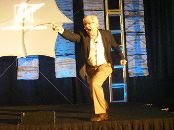 top business consultant joe calloway goes out of his way to demonstrate to the crowd how they need to stand out from the competition.